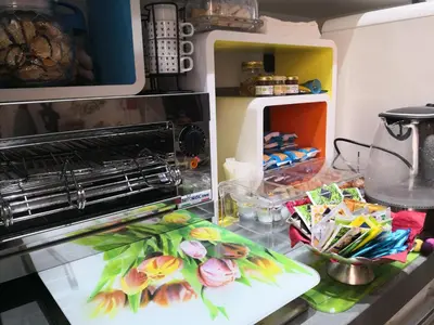 a kitchen with an oven with food on a counter at CoPPoLaMyHouse in Rome