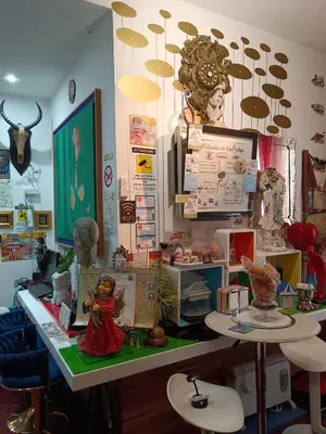 a room with a table with some figurines on it at CoPPoLaMyHouse in Rome