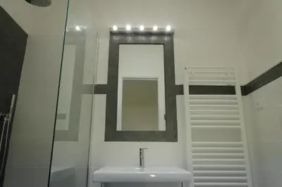 a bathroom with a sink and a mirror at Castellani A San Pietro in Rome