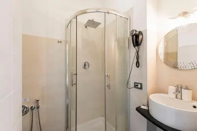 a bathroom with a shower and a sink at B&B Blueberry Rooms in Rome
