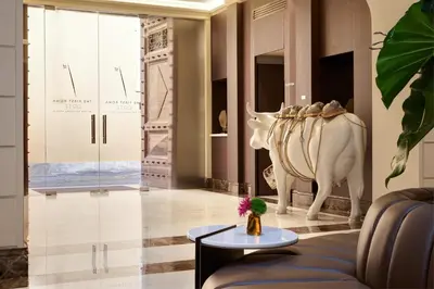 a living room with a couch and a table at The First Arte - Preferred Hotels & Resorts in Rome