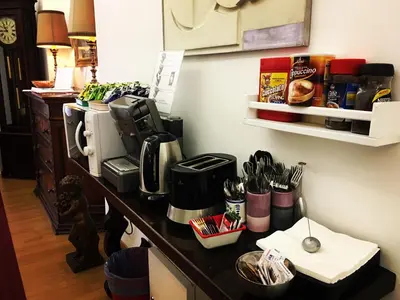 a kitchen counter with a coffee maker on it at Vatican Paradise in Rome