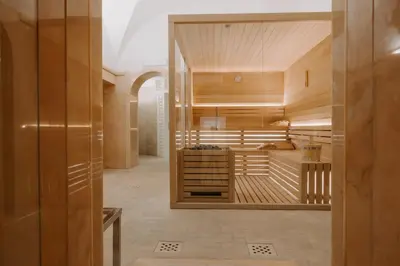 a room with wood paneling and a hallway with a room with at Villa Spalletti Trivelli - Small Luxury Hotels of the World in Rome