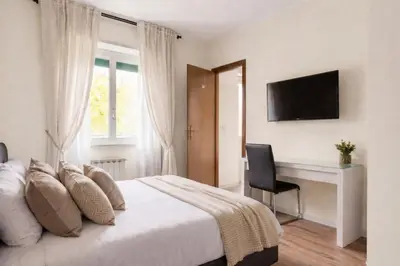 a bathroom with a toilet and a shower at Amelia 5 in Rome