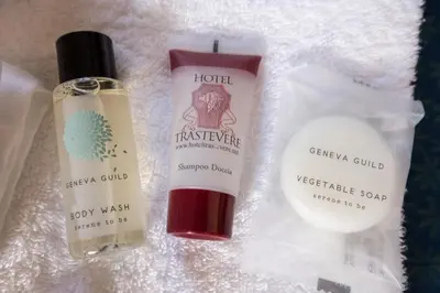 a group of three products sitting on a towel at Hotel Trastevere in Rome