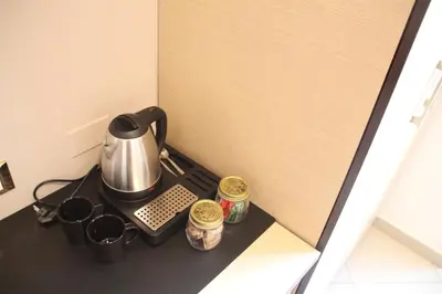 a tea kettle on a counter in a kitchen at All Seasons in Rome