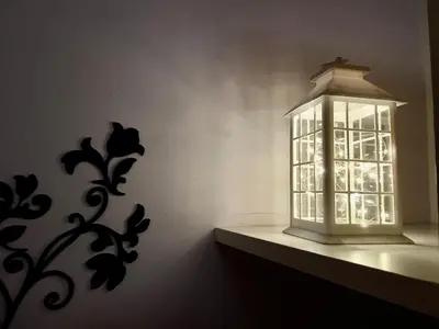 a lantern sitting on a shelf next to a wall at Rhome86 in Rome