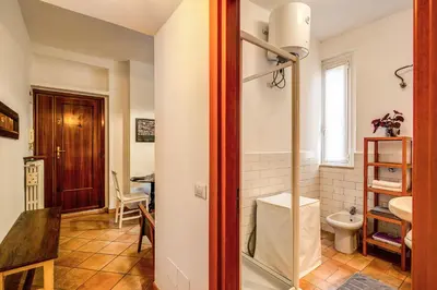 a bathroom with a toilet and a sink at ilPlatano-Testaccio in Rome