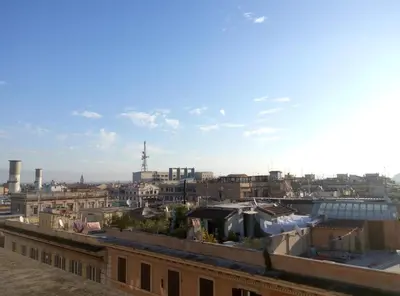 a view of a city from the roof of a building at Meraviglia in Rome