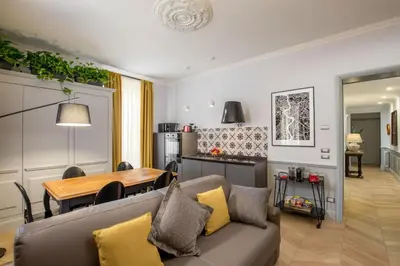 a living room with a couch and a table at Borgo Pio Charme in Rome
