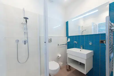 a bathroom with a toilet and a sink and a shower at Bed & Breakfast Armonie Romane in Rome