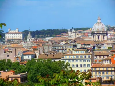 a view of a building through a window at Via Giulia Apartment in Rome