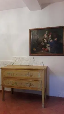 a room with a cabinet and a door and a glass floor at Via Giulia Apartment in Rome