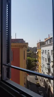 a view of a city street from a balcony at Lele Rooms San Lorenzo in Rome