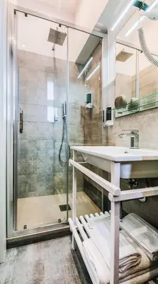 a bathroom with a shower and a sink at Lele Rooms San Lorenzo in Rome