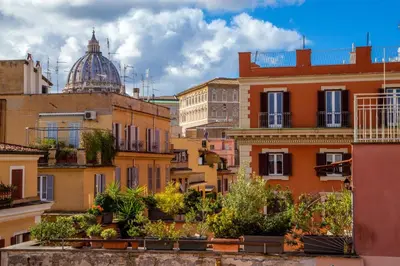 a view of the roofs of buildings with plants at Hotel Della Conciliazione in Rome