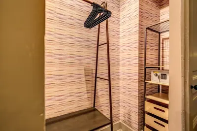 a shower with a glass door in a bathroom at DeCharme apartment with terrace in Monti in Rome
