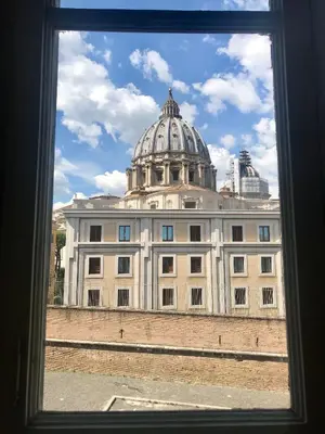 a view of a building from a window at La Vaticana - Saint Peters View - Apt Rome in Rome