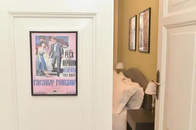 a picture of a movie on the door of a bedroom at Colazione Al Vaticano Guest House in Rome