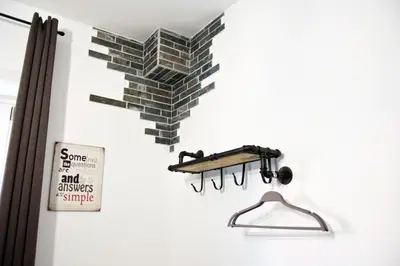 a group of bricks hanging on a wall at Damiva in Rome