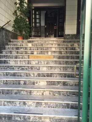 a set of stairs in front of a house at Rent Rooms Colosseum in Rome