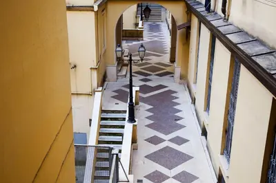 an alley with a tile floor and a building at Residenza Dei Gracchi in Rome