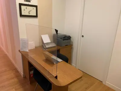 a desk with a laptop computer on top of it at Residenza Dei Gracchi in Rome