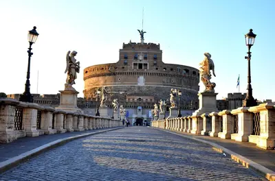 a large building with a street in front of it at L'Oleandro di Alfredo in Rome