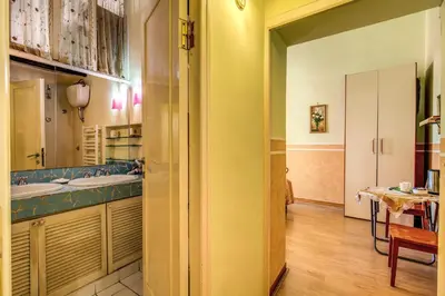 a bathroom with a sink and two sinks at GuestHouse o Affittacamere Magenta Baylon Suite in Rome