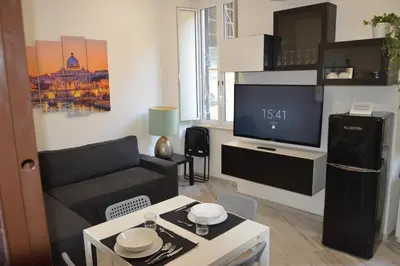 a living room with a couch and a tv at Apartment Silvestri in Rome