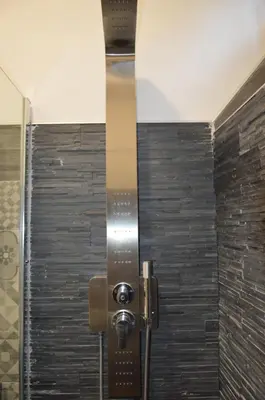 a door to a shower in a bathroom at Apartment Silvestri in Rome