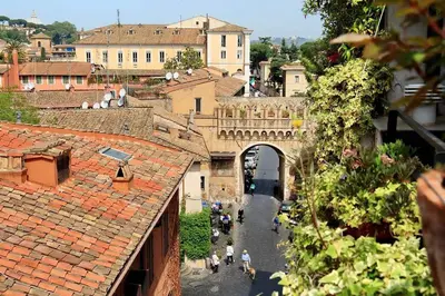 a group of people walking down a street in a city at Scala Luxury Terrace studio in Rome