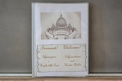 a framed picture of a building in a picture frame at St. Peter's Refuge 2 in Rome