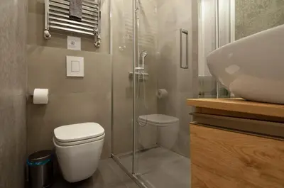 a bathroom with a shower and a toilet and a sink at Urbanflat Repubblica Square in Rome