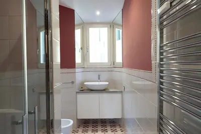 a bathroom with a sink and a mirror at Rome in Rome in Rome