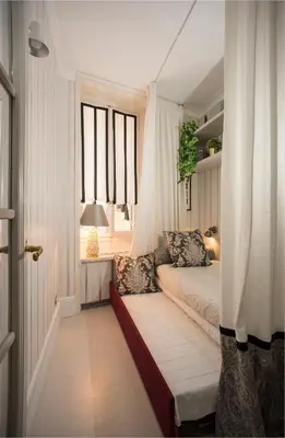 a small bedroom with a bed and a window at Roma Fontana di Trevi in Rome