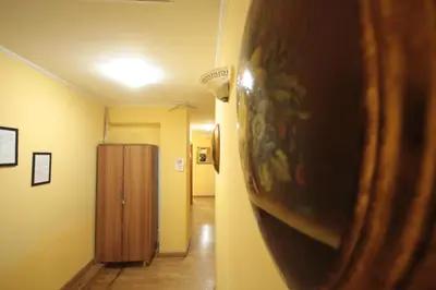 a room with a hallway with a door and a room with at Hotel Termini in Rome