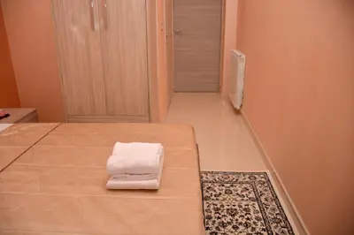 a room with a bed with two towels on it at Rome Innitaly Affittacamere o GuestHouse in Rome