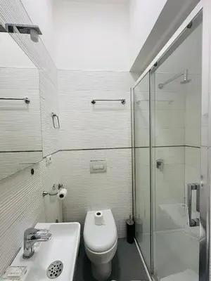 a bathroom with a toilet and a sink and a shower at Rome Innitaly Affittacamere o GuestHouse in Rome