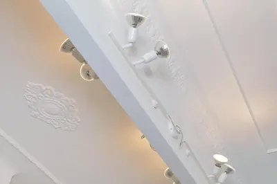 a white door with white handles in a room at Modern Apartment Quirina 300 mt from Vatican in Rome