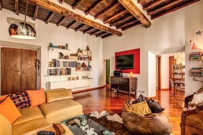 a living room with a couch and a tv at Pellegrino in Rome
