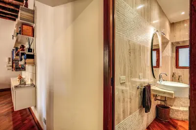 a bathroom with a sink and a mirror at Pellegrino in Rome