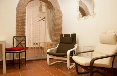 a room with two chairs and a window at TRASTEVERE - STUDIO APT. x 2 in Rome