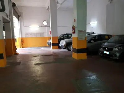 a kitchen with a stove and a counter top at Qflat Aura Paradise Vatican with parking garage in Rome