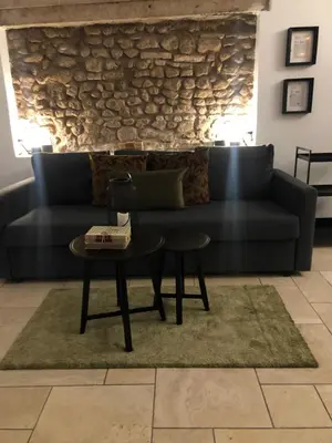 a living room with a couch and a table at Pantheon, Campo de fiori mini garden in Rome