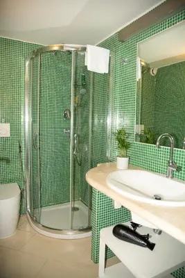 a bathroom with a shower and a sink at House Domusella in Rome