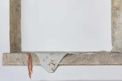 an old concrete ledge with a bow tie on it at A World Aparts - 105 Pellegrino in Rome