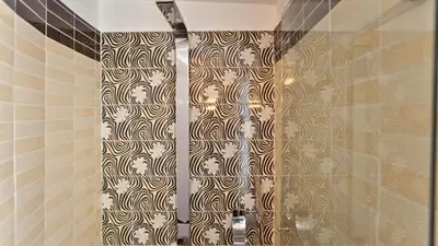 a shower curtain with skulls on it in a bathroom at Rental in Rome Loft Cappellari in Rome