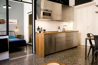 a kitchen with a sink and a counter top at Appart in Rome