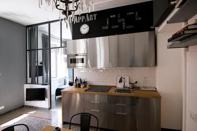 a kitchen with a sink and a counter top at Appart in Rome